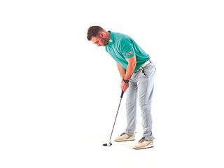 Joshua Mayo demonstrating the correct posture for putting