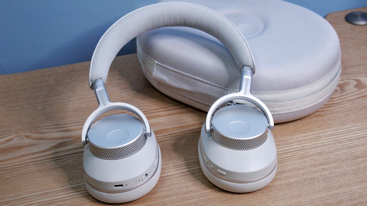 Cambridge Audio Melomania P100 SE headphones and case on a table.
