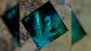 A photo showing a shipwreck underwater