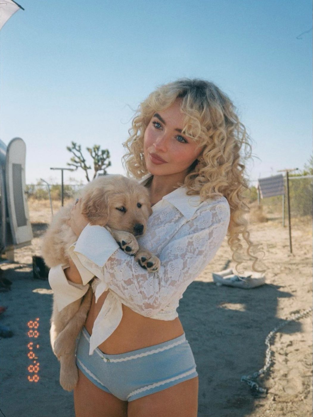 Sabrina Carpenter on set for her Manchild music video.