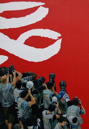 Image of a crowd of journalists taking pictures at the Beijing Olympics