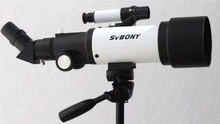 The Encalife SVBONY 501P 70 against a white wall backdrop