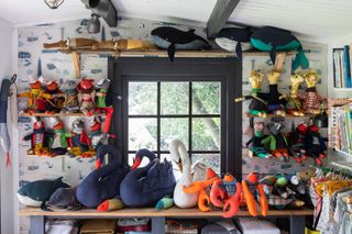 home office filled with fabric and soft toy animals