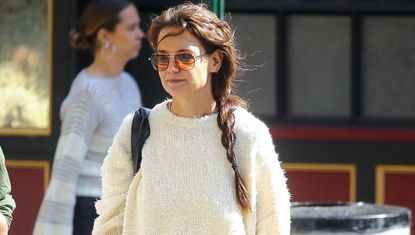 Katie Holmes walks around Manhattan wearing a cuddly sweater and the Mary Jane trend in a pair by Vibi Venezia