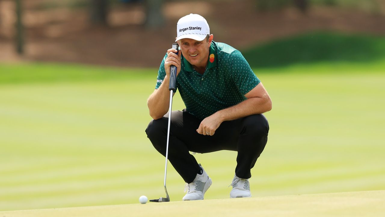 Justin Rose reads the green at TPC Sawgrass