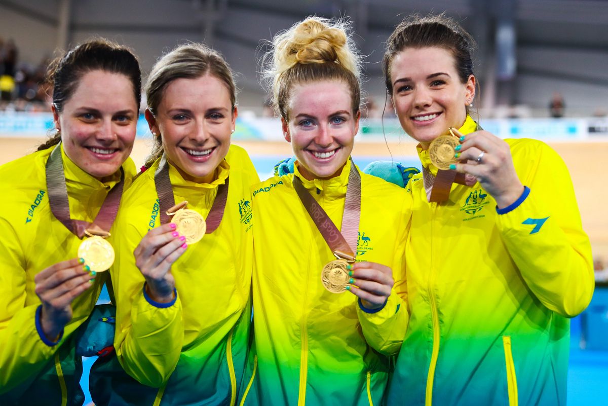 The Australian quartet show off the first ever women's team pursuit gold medals at the Commonwealth Games