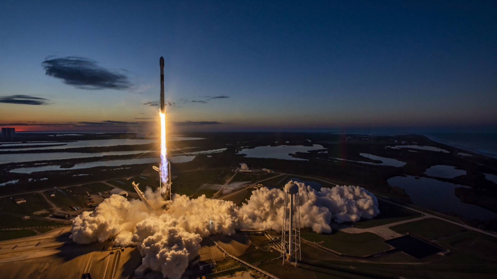 A SpaceX Falcon 9 rocket launches the OneWeb 1 in twilight from Cape Canaveral, Florida on Dec. 8, 2022.