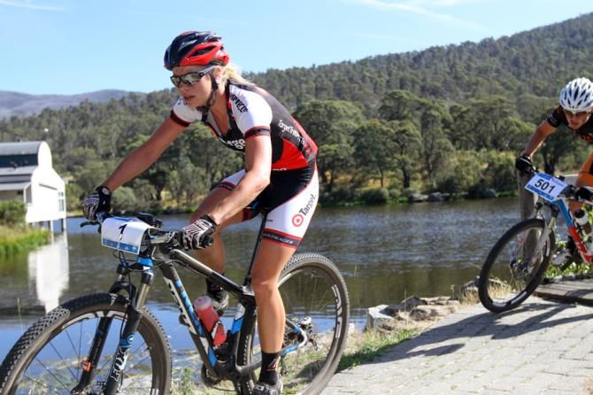 Peta Mullens chases her teammate