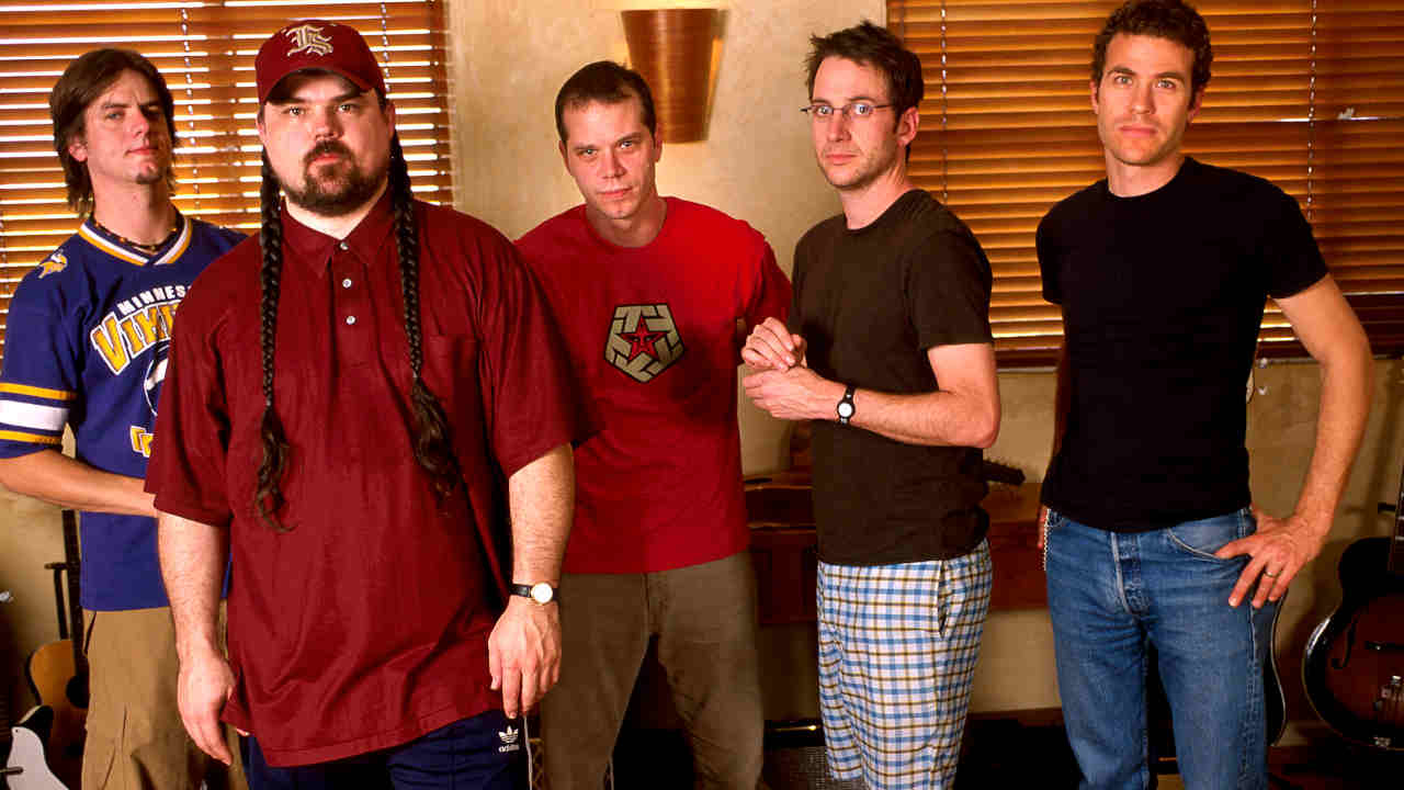 The band Brad photographed in a recording studio in 2002