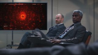 Mark Gatiss and Charles Parnell sit in on an intelligence briefing in Mission: Impossible - Dead Reckoning Part One.