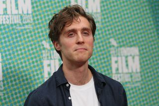 Jack Farthing poses on the red carpet upon arrival for the European premiere of the film "Official Secrets" in London on October 10, 2019