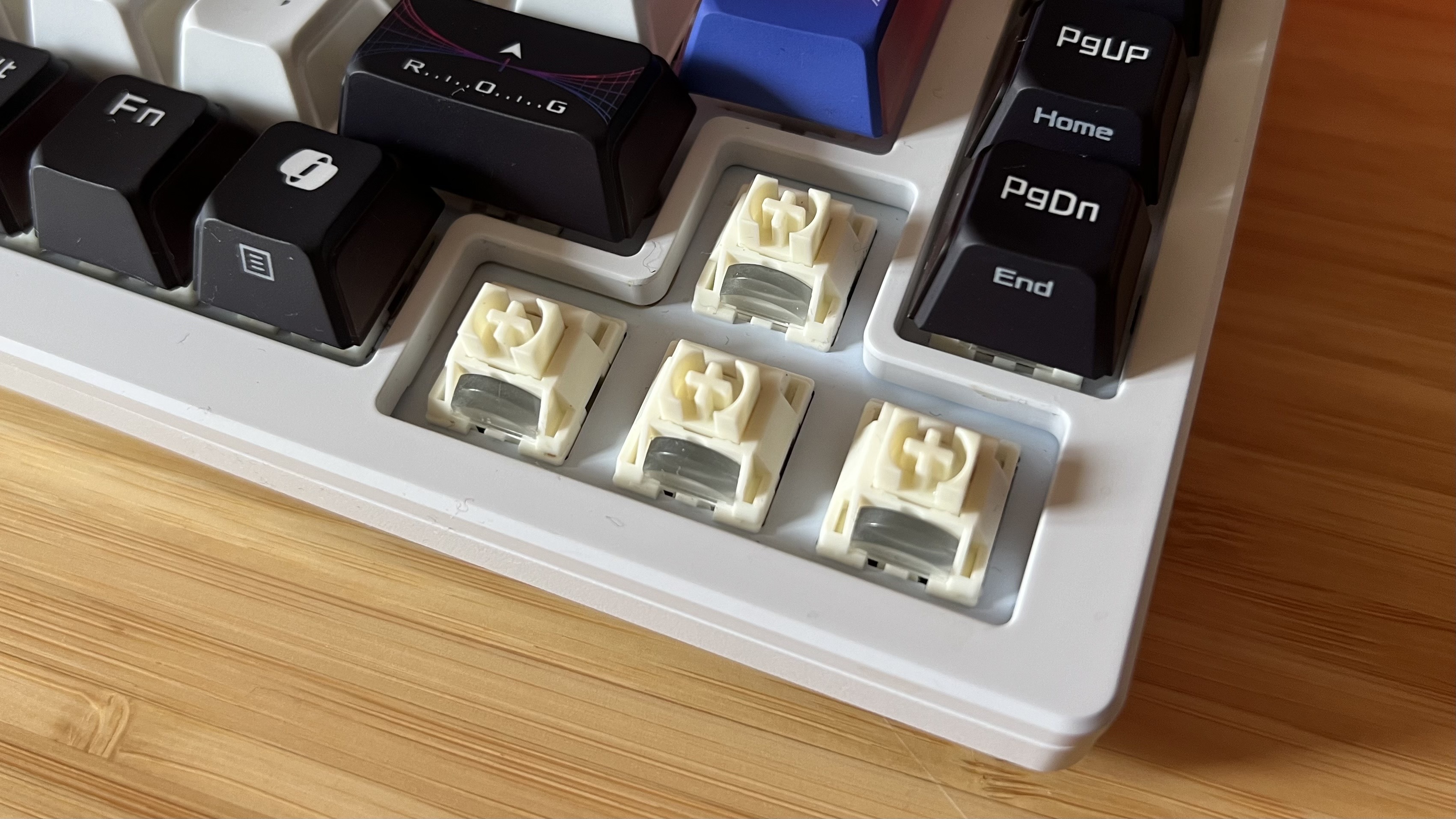 Close up on Asus ROG Azoth X switches with keycaps removed