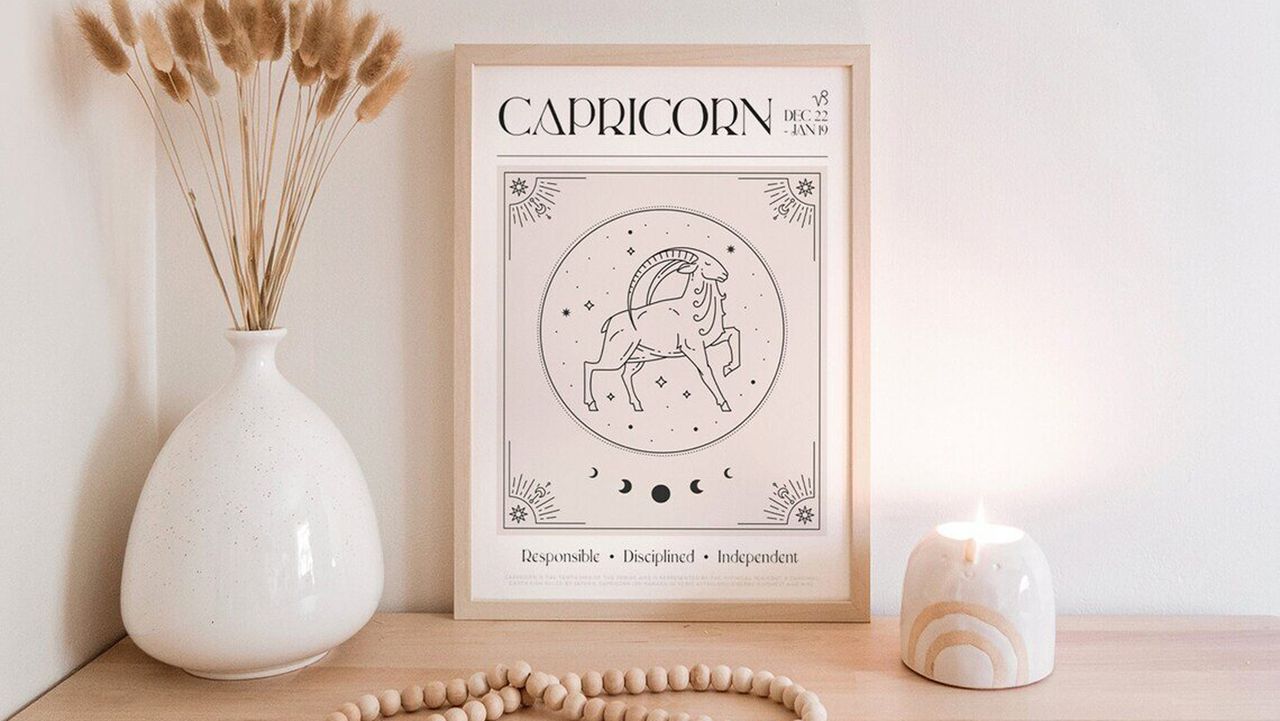 Capricorn framed print with bunnytail grass in vase &amp; glowing candle