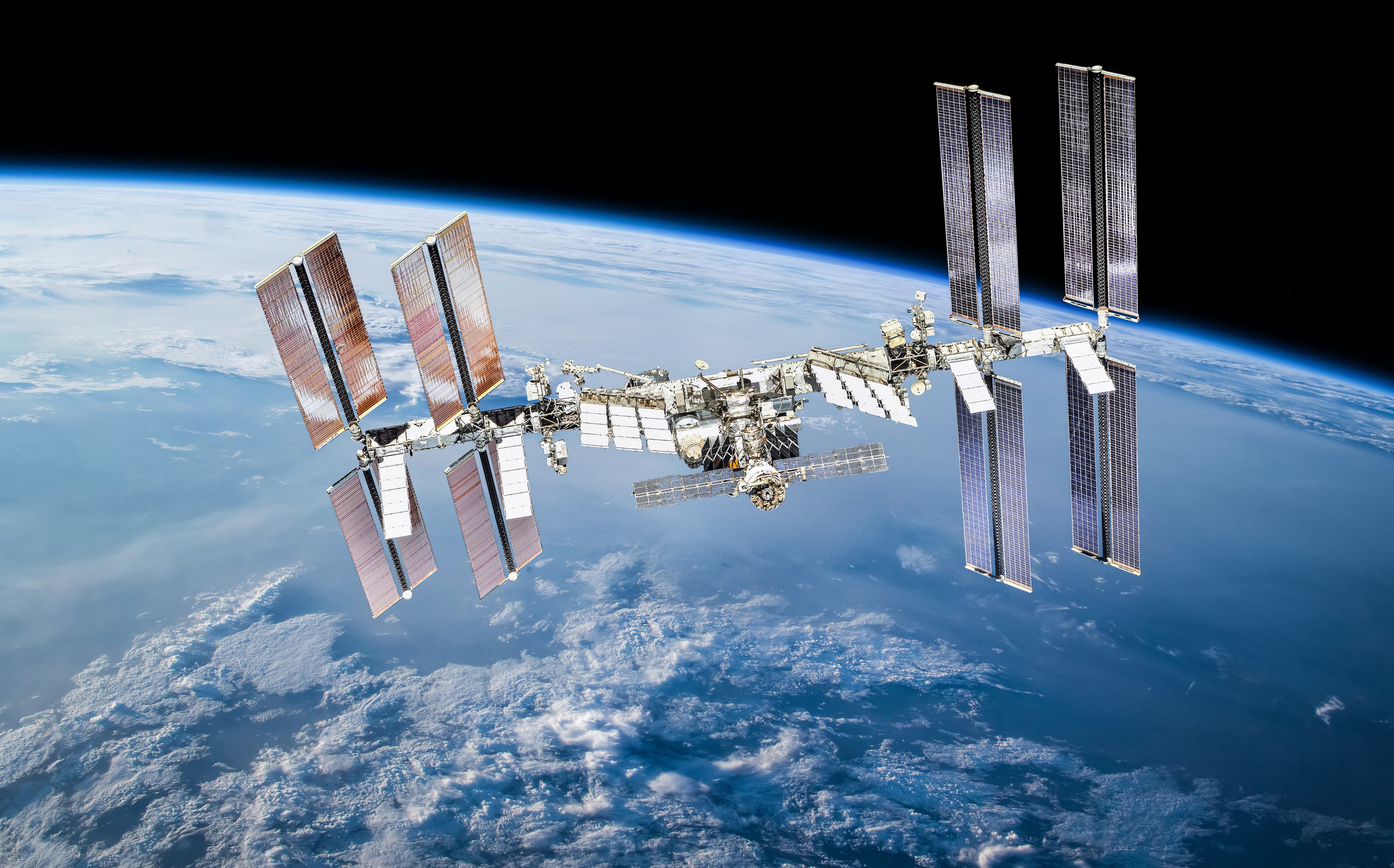 ISS station on orbit of the Earth planet. Elements of this image furnished by NASA - stock photo International space station with astronauts. Elements of this image furnished by NASA 