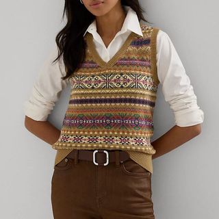 Flat lay image of woman wearing knitted vest