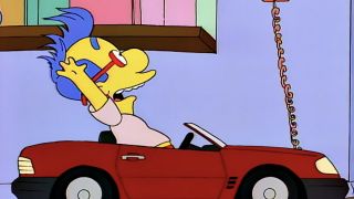 Milhouse in battery-powered car in The SImpsons