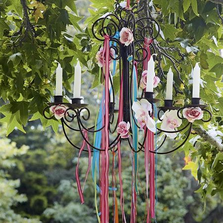 garden area with chandelier and candles