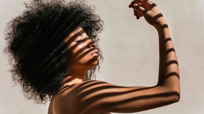 Mental health tips: A woman with a shadow on her face
