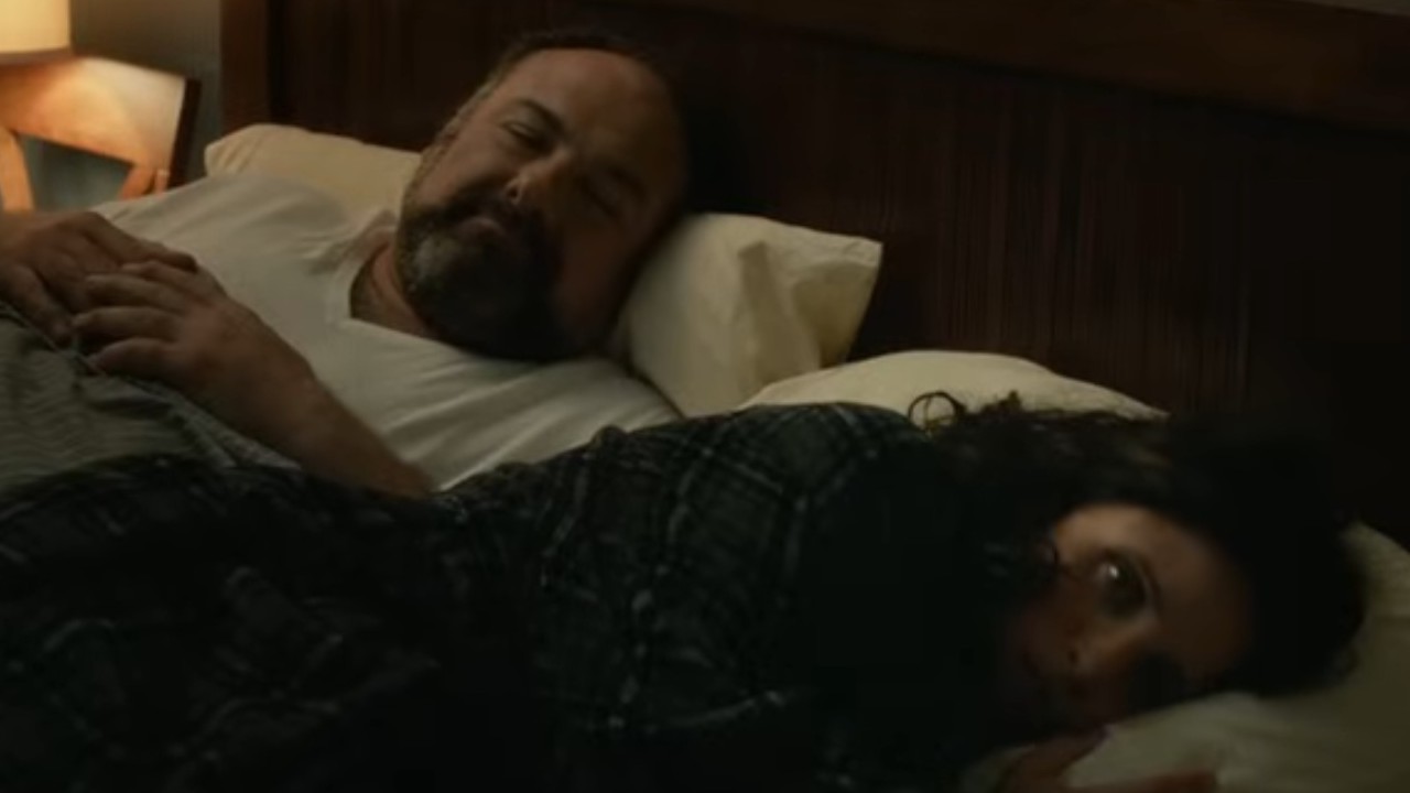 James Gandolfini shairing a bed with Julia Louis-Dreyfus in Enough Said