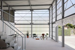 open industrial interior at arii irie's Warehouse Villa in Isumi