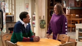 Mike Epps and Kim Fields laughing togther as Bennie and Regina in The Upshaws