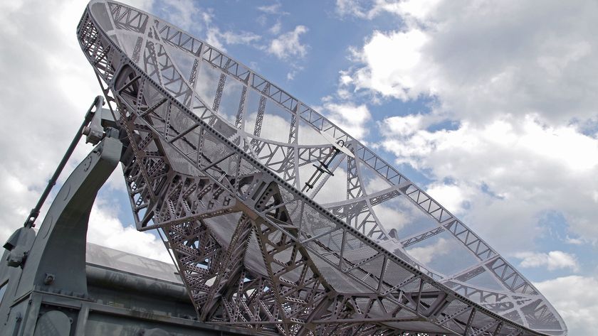 A metal radio dish points at the top right corner of the image