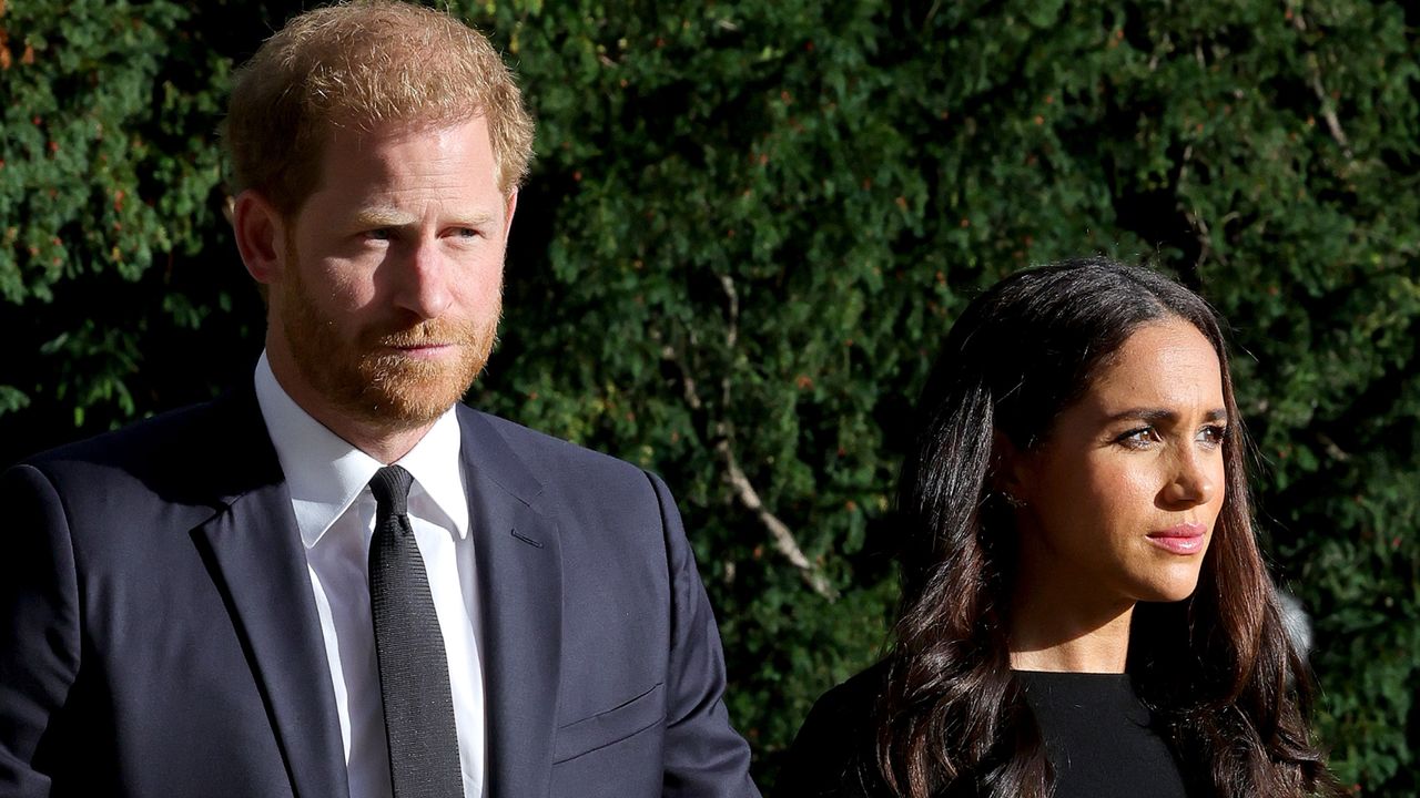 Meghan Markle and Prince Harry wear black as they view tributes at Windsor Castle to Queen Elizabeth, who died on September 8, 2022