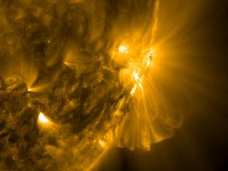 Charged particles spin along magnetic field lines extending from the sun's surface, visually observable in extreme ultraviolet light by the Solar Dynamics Laboratory spacecraft, Apr. 3-5, 2011.