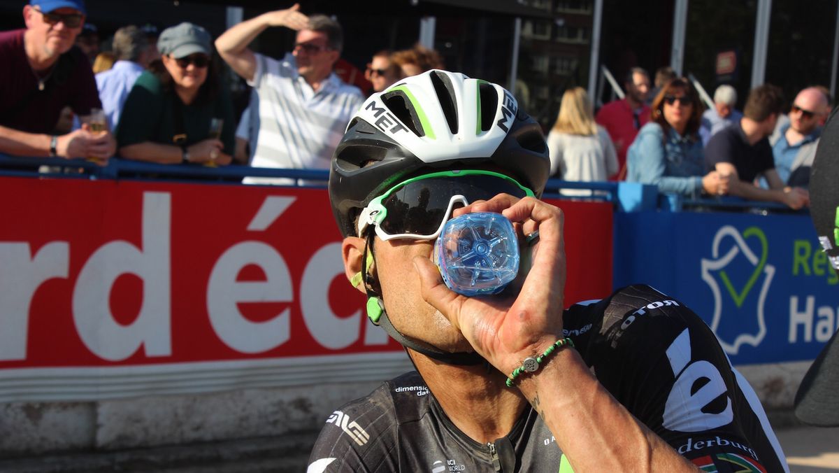 Jay Thomson hydrates at the finish