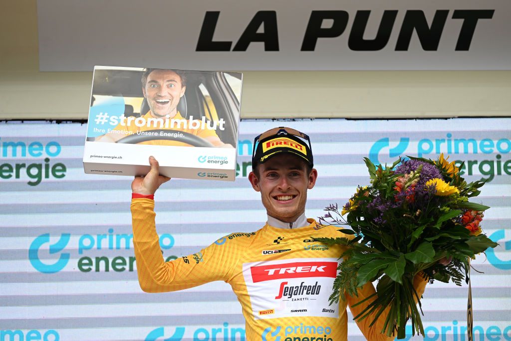 LA PUNT SWITZERLAND JUNE 15 Mattias Skjelmose Jensen of Denmark and Team TrekSegafredo celebrates at podium as Yellow Leader Jersey winner during the 86th Tour de Suisse 2023 Stage 5 a 211km stage from Fiesch to La Punt 1696m UCIWT on June 15 2023 in La Punt Switzerland Photo by Dario BelingheriGetty Images