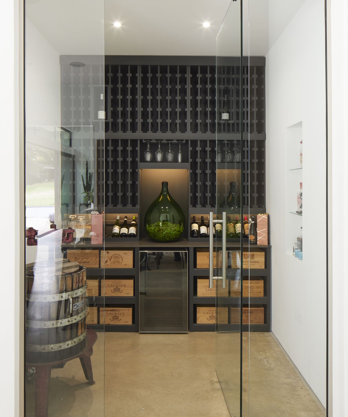 temperature controlled wine storage room with fridge