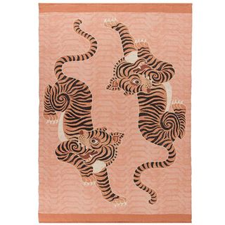 Pink tiger rug with two tigers on it