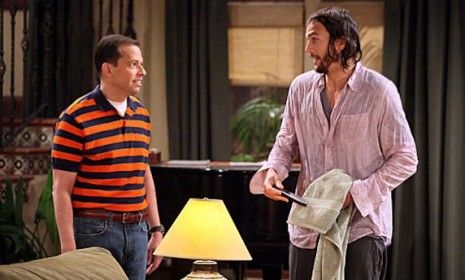 Ashton Kutcher made his debut as sad-sack billionaire Walden Schmidt on &amp;quot;Two and a Half Men&amp;quot; Monday, getting most of his laughs from his repeatedly semi-nude state. 