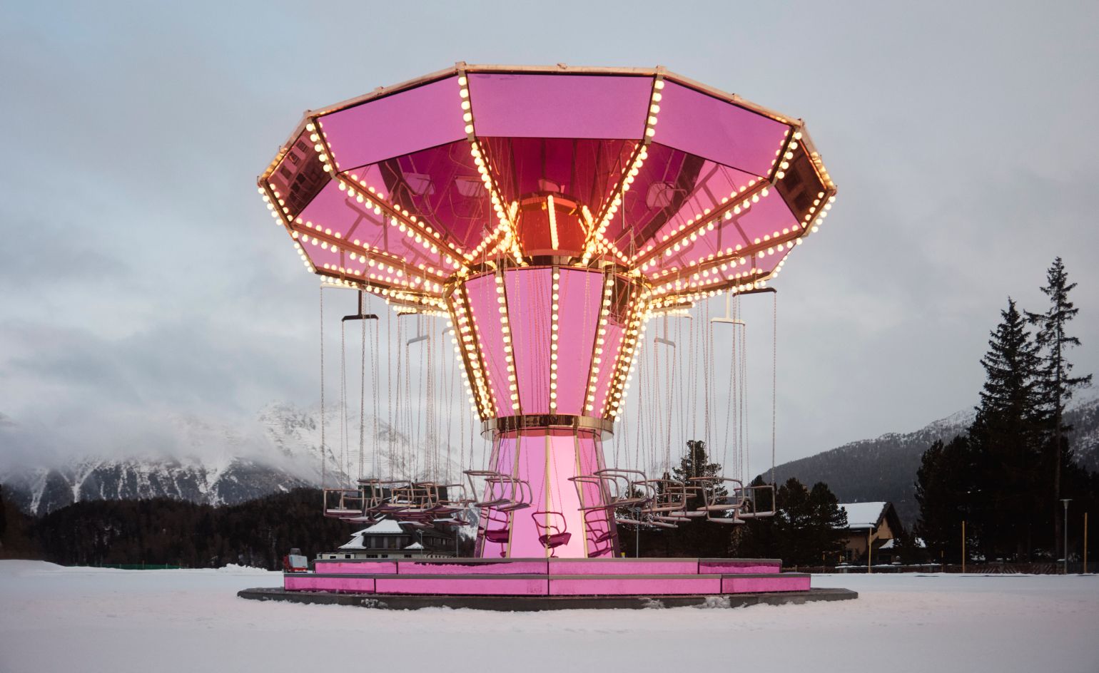 A hot pink carousel just touched down in the Swiss Alps, thanks to Carsten Höller