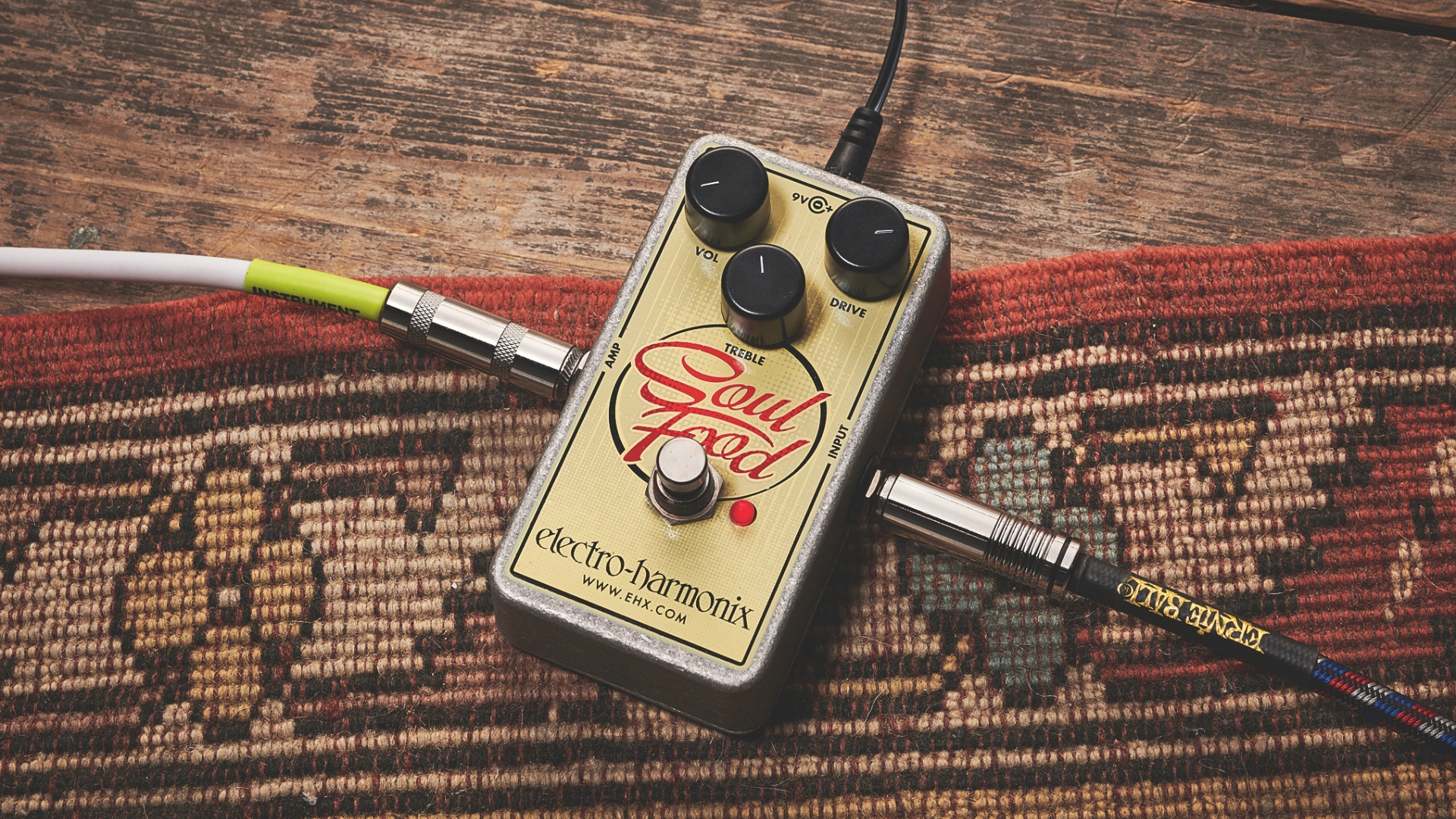 An Electro-Harmonix Soul Food Klon clone guitar pedal on a rug