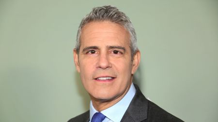 andy cohen on a green background