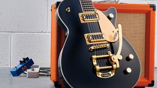 A Gretsch electric guitar, Orange amp and guitar pedals