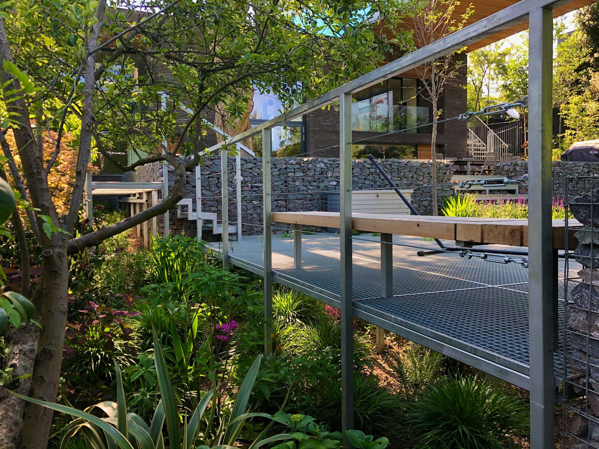 sloping garden ideas: CITYSCAPERS designed terraced plot