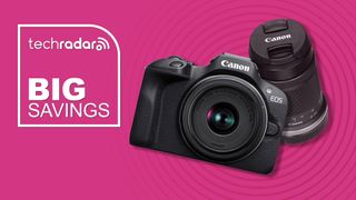 Canon EOS R100 with lens on a pink background with TechRadar big saving text overlay