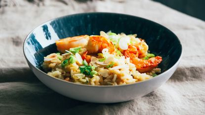 Paella served with rice, cooked healthily