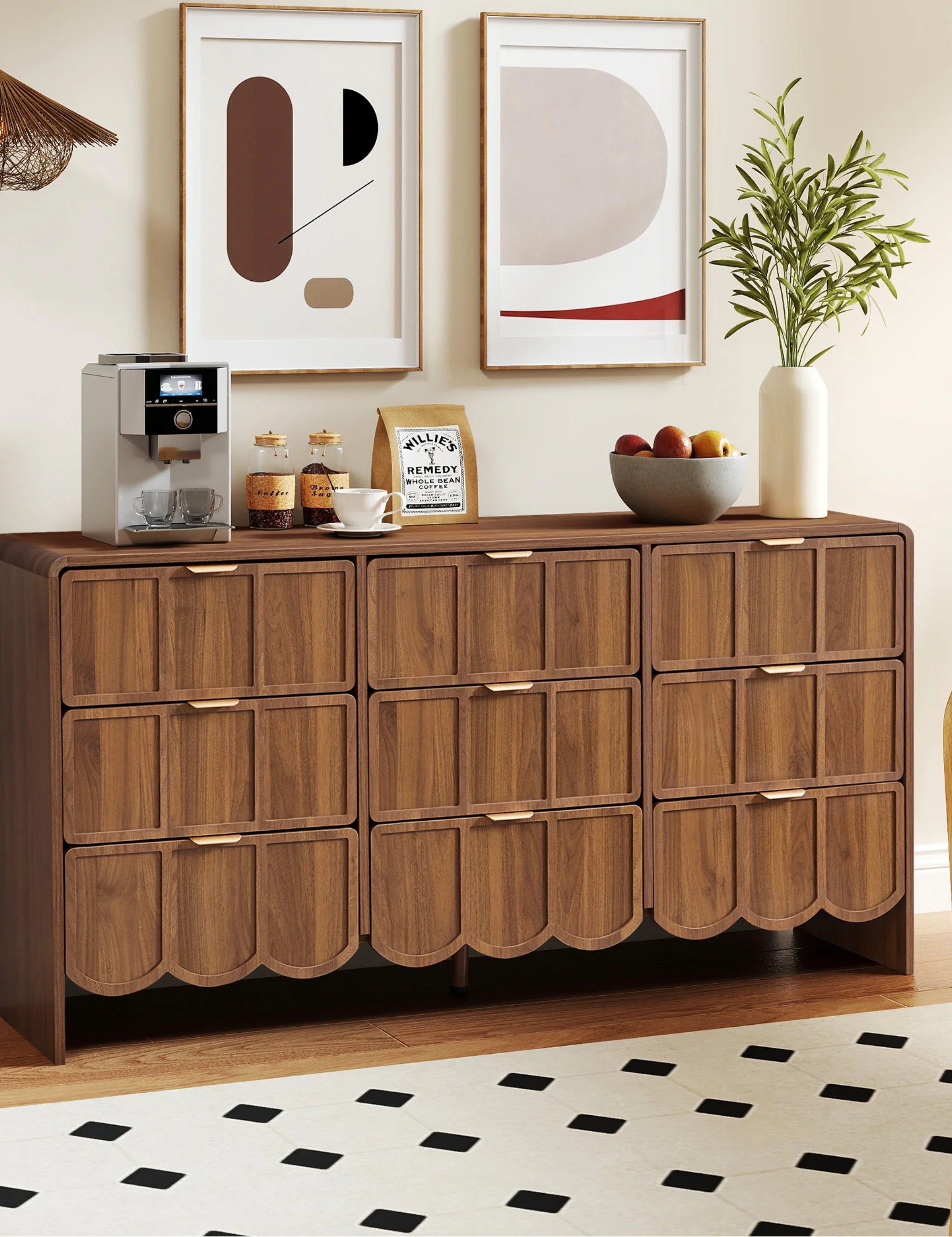 Scallop-edged wooden dresser styled alongside contemporary art