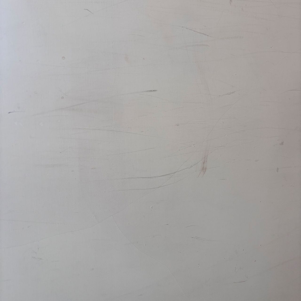 white wall with scuff marks