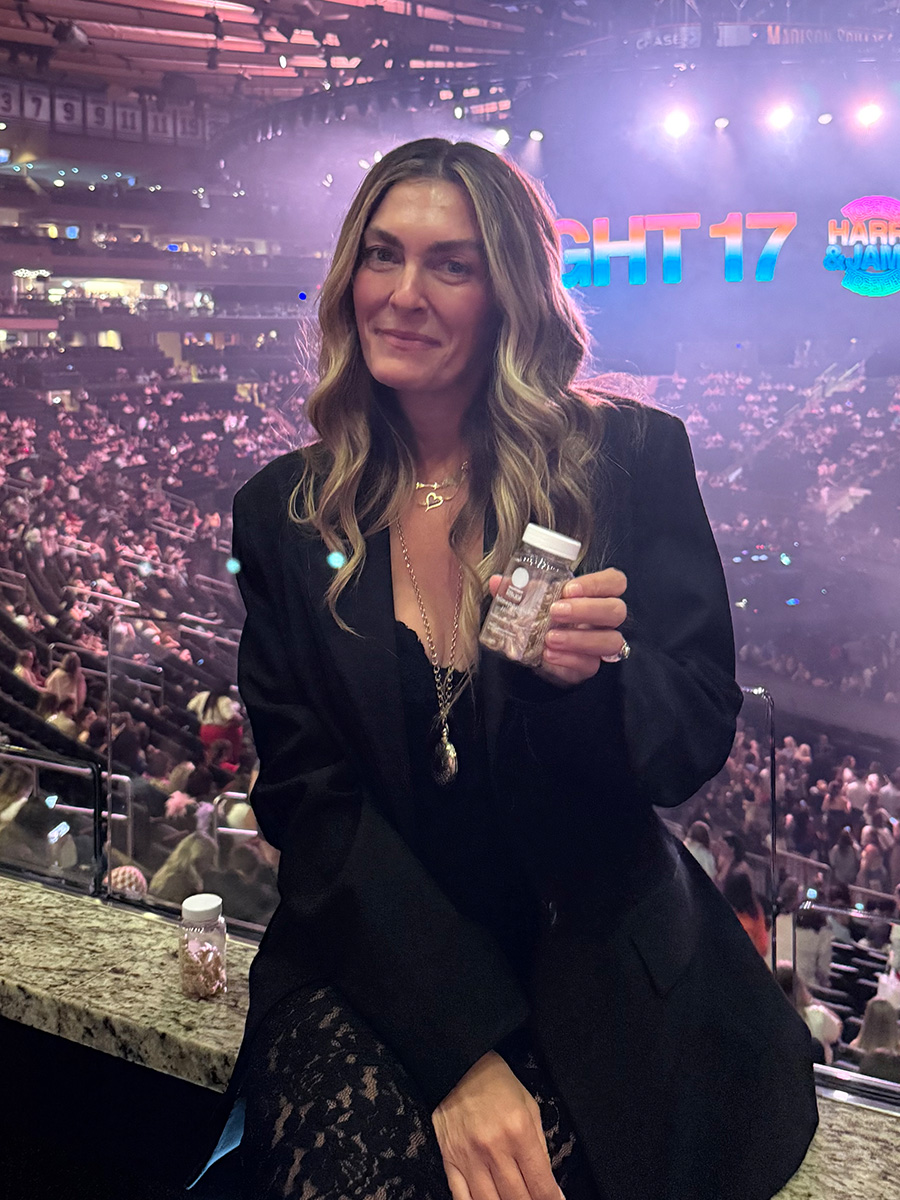 stroller in the city at concert holding ritual bottle