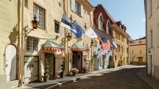The outside of Schlössle Hotel Tallinn on an Old Town street
