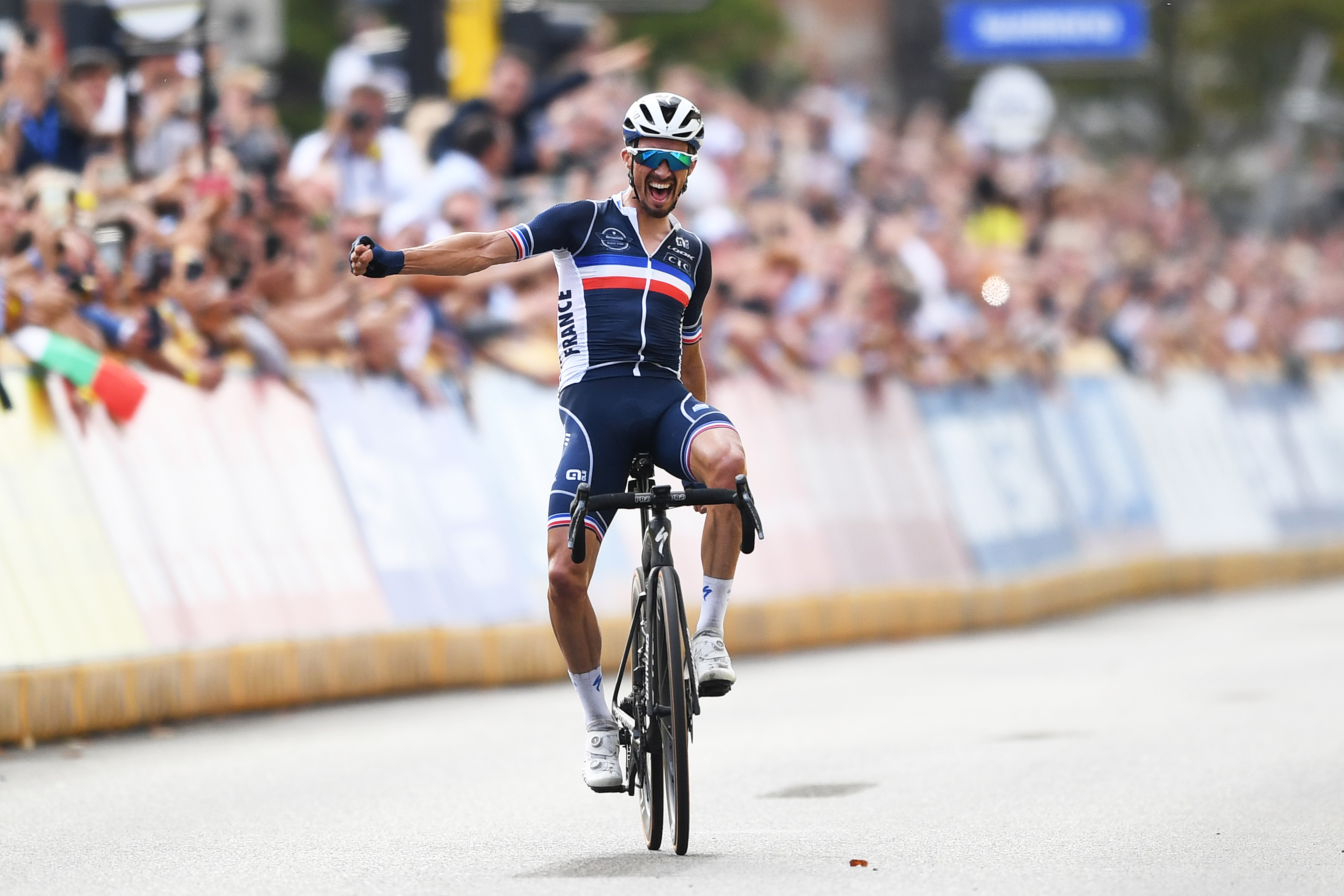 Julian Alaphilippe of France celebrates at finish line as race winner during the 94th UCI Road World Championships 2021 - Men Elite Road Race a 268,3km race from Antwerp to Leuven / #flanders2021 / on September 26, 2021 in Leuven, Belgium. (Photo by Tim de Waele/Getty Images)