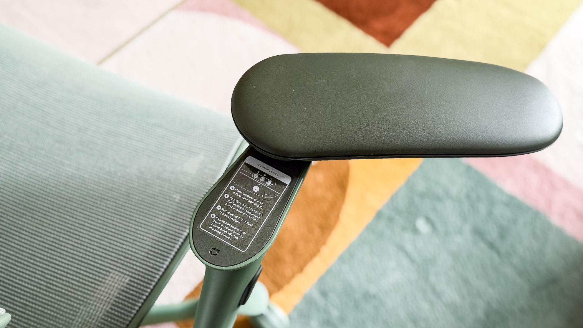 A pivoting arm pad on the ErgoTune Vesby office chair
