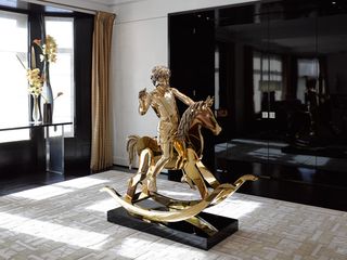 exgibition with rocking horse sculpture