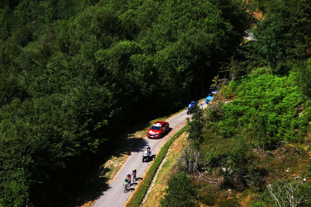 HAUTACAM FRANCE JULY 21 Wout Van Aert of Belgium and Team Jumbo Visma Green Points Jersey Daniel Felipe Martinez Poveda of Colombia and Team INEOS Grenadiers and Thibaut Pinot of France and Team Groupama FDJ compete in the breakaway at the Col de Spandelles 1371m during the 109th Tour de France 2022 Stage 18 a 1432km stage from Lourdes to Hautacam 1520m TDF2022 WorldTour on July 21 2022 in Hautacam France Photo by Michael SteeleGetty Images