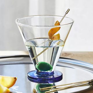 Stemless martini glass with glass olive and blue base