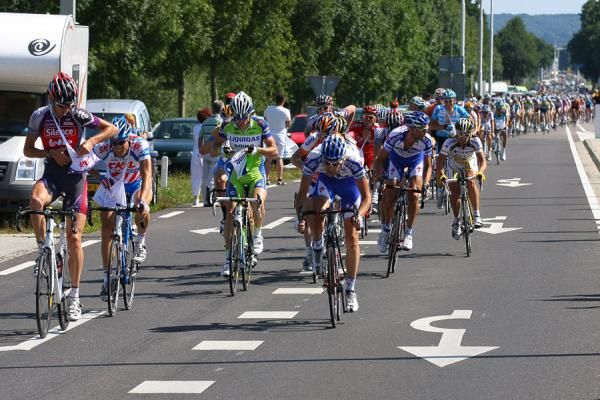 The peloton collect lunch on stage five of the Eneco Tour